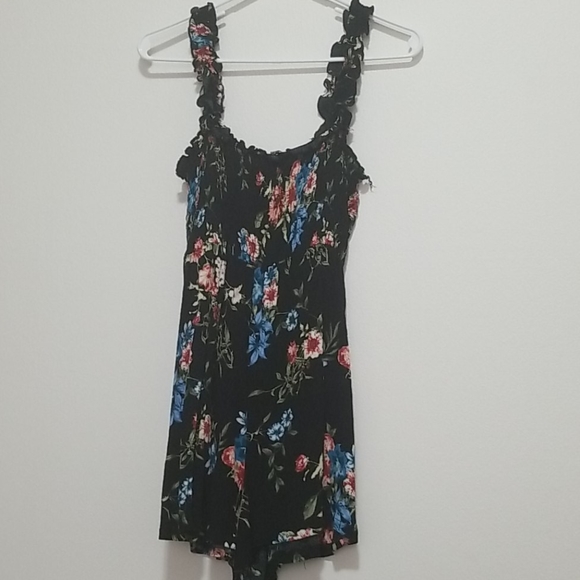 Adorable sun suit/ shorts that appear as a skirt. - Picture 2 of 4